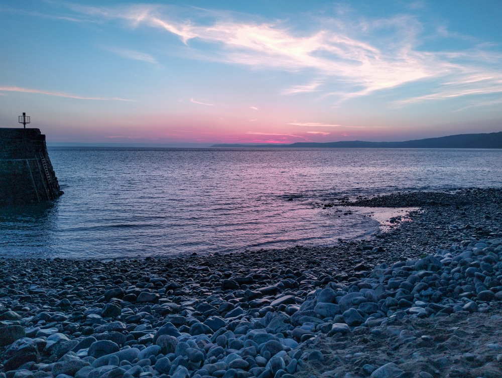 View from the harbour in Clovelly seaview and morning sunrise